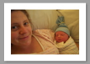 09aHappyMomWithBaby2.JPG